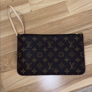 Very lightly used Louis Vuitton Pouch!